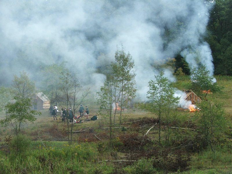 A Burning  Settlement
